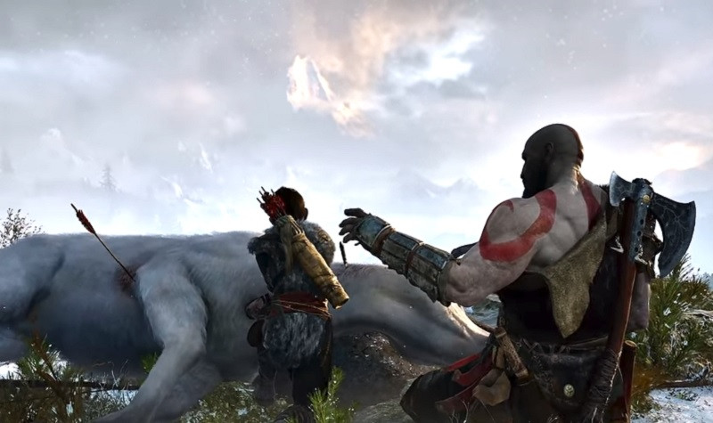 Kratos tries to comfort his son in God of War.