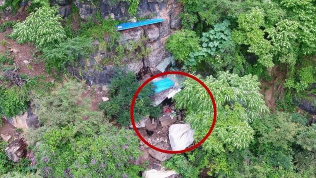Drones spotted the cave on a steep hillside