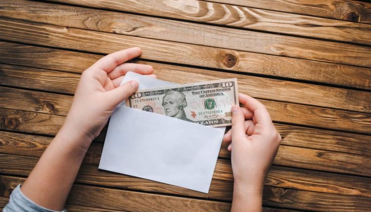 How to Use the Cash Envelope System to Stop Overspending