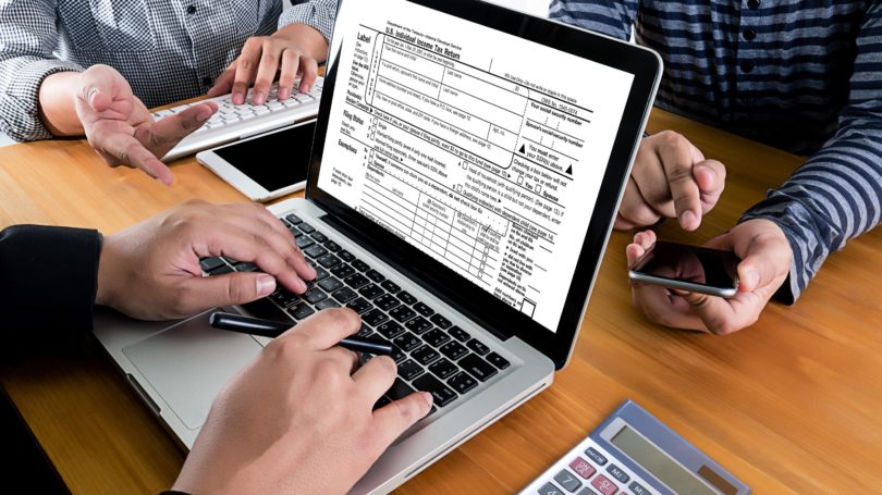 Preparing For Taxes 1040 Form Laptop