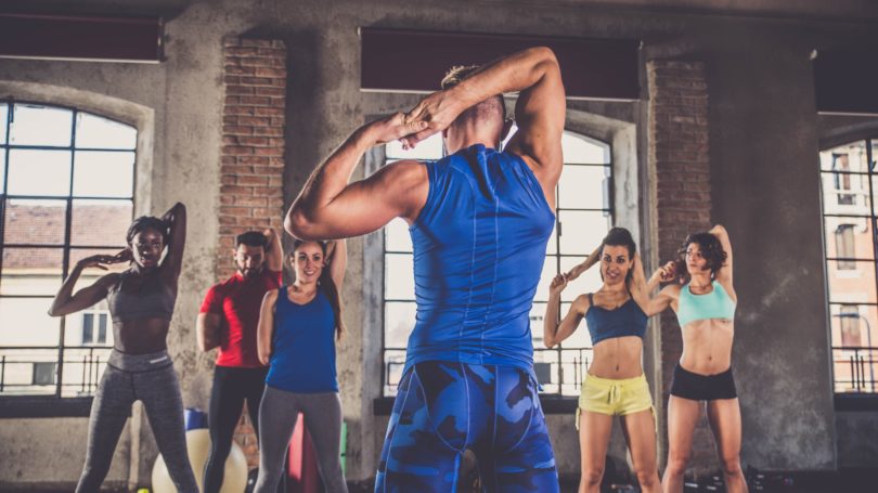 Fitness Instructor Group Bootcamp Class Stretching